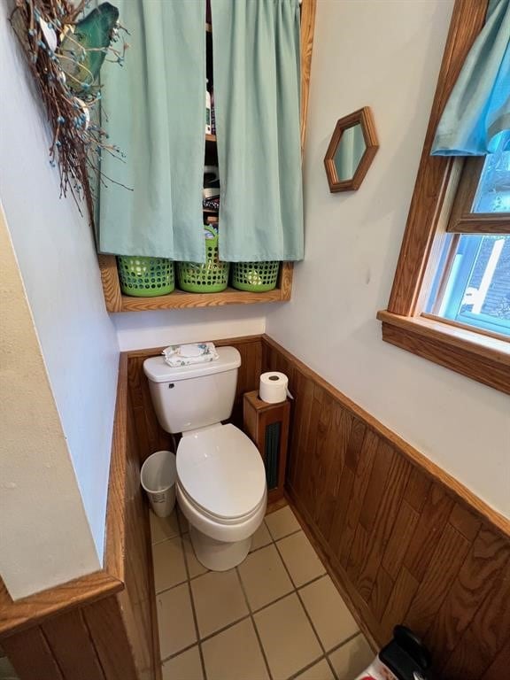 13478 Old Lake Rd Unit 63, Springfield, PA 16411 - half bathroom featuring tile patterned flooring and wainscoting