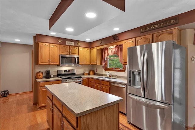 108 Birchwood Way, Penn Twp Wml, PA 15642 - kitchen featuring appliances with stainless steel finishes, light wood-type flooring, recessed lighting, light countertops, and a center island