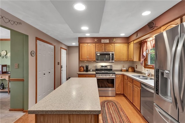 108 Birchwood Way, Penn Twp Wml, PA 15642 - kitchen with stainless steel appliances, light countertops, recessed lighting, light wood-type flooring, and a center island