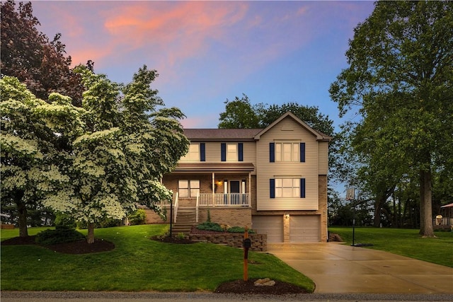 108 Birchwood Way, Penn Twp Wml, PA 15642 - view of front of property with an attached garage, driveway, a lawn, stairway, and brick siding