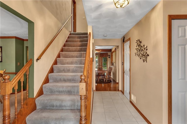 108 Birchwood Way, Penn Twp Wml, PA 15642 - stairway featuring tile patterned flooring and baseboards