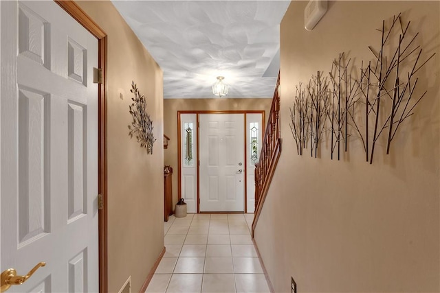 108 Birchwood Way, Penn Twp Wml, PA 15642 - doorway to outside with light tile patterned flooring and baseboards