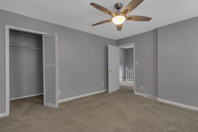 39 Mcgovern Blvd, Moon/Crescent Twp, PA 15046 - unfurnished bedroom with carpet floors, a closet, and a ceiling fan