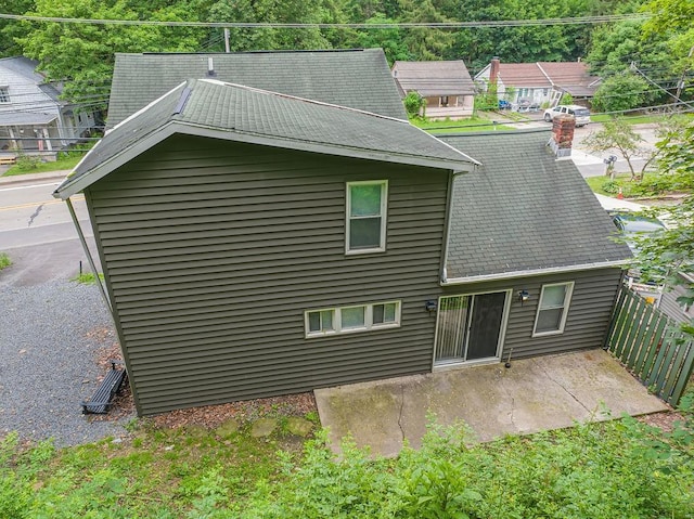39 Mcgovern Blvd, Moon/Crescent Twp, PA 15046 - rear view of property with a patio and a shingled roof