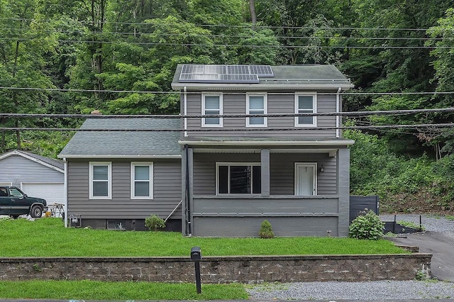 39 Mcgovern Blvd, Moon/Crescent Twp, PA 15046 - view of front of property featuring a porch, a front lawn, and a forest view