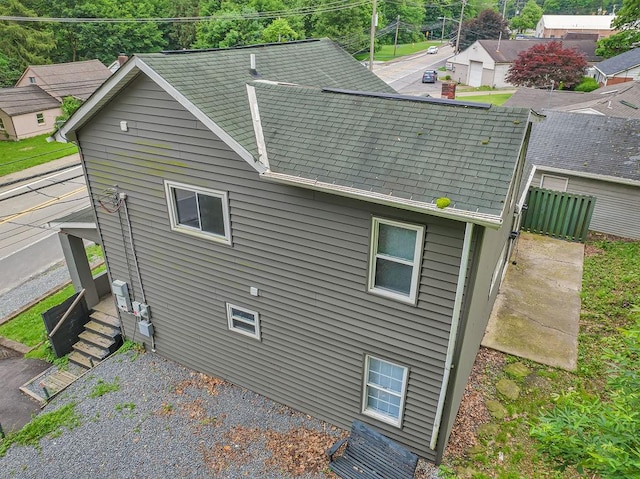 39 Mcgovern Blvd, Moon/Crescent Twp, PA 15046 - view of side of home featuring roof with shingles