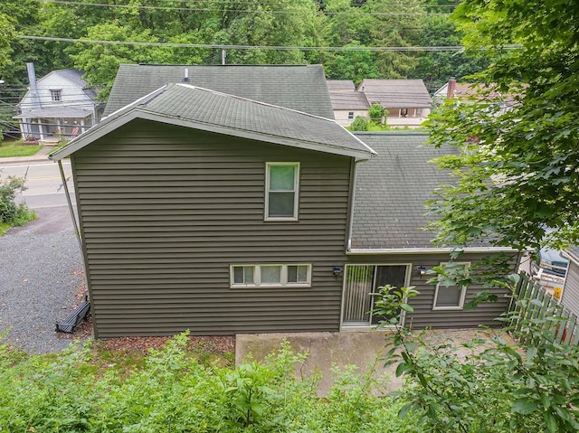 39 Mcgovern Blvd, Moon/Crescent Twp, PA 15046 - rear view of house with a shingled roof