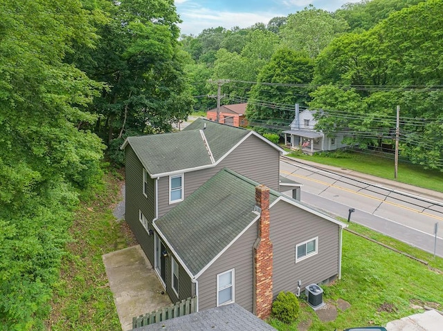 39 Mcgovern Blvd, Moon/Crescent Twp, PA 15046 - aerial view of property and surrounding area featuring a heavily wooded area