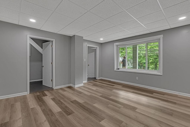 39 Mcgovern Blvd, Moon/Crescent Twp, PA 15046 - spare room with wood finished floors, a drop ceiling, and recessed lighting