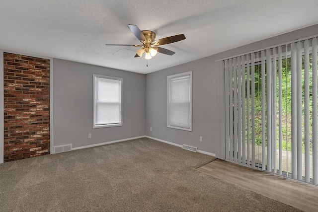 39 Mcgovern Blvd, Moon/Crescent Twp, PA 15046 - carpeted spare room featuring a ceiling fan and a textured ceiling