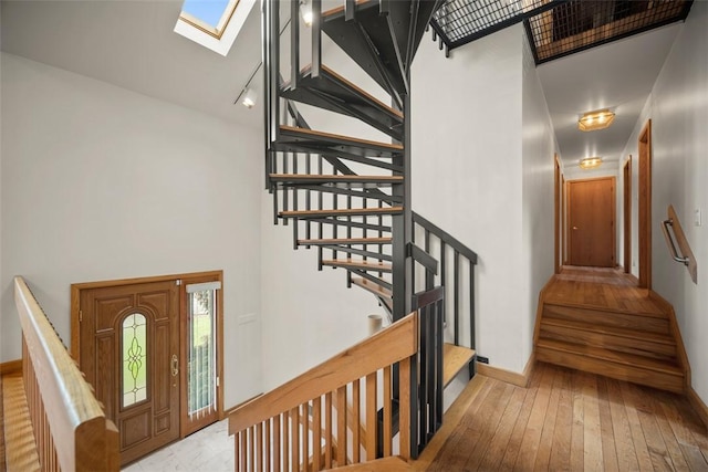 240 Rte 88, Monongahela, PA 15063 - stairs with a high ceiling, a skylight, and hardwood / wood-style flooring