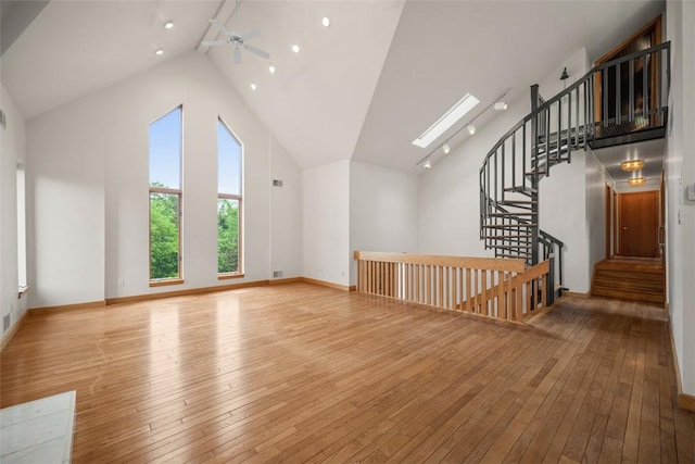 240 Rte 88, Monongahela, PA 15063 - unfurnished living room with high vaulted ceiling, hardwood / wood-style flooring, a ceiling fan, and stairway