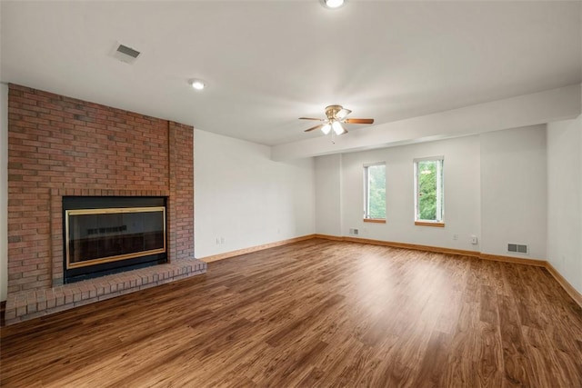 240 Rte 88, Monongahela, PA 15063 - unfurnished living room featuring ceiling fan, wood finished floors, a brick fireplace, and recessed lighting