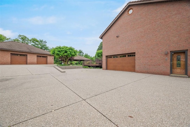 240 Rte 88, Monongahela, PA 15063 - view of side of home featuring a garage and concrete driveway