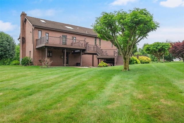 240 Rte 88, Monongahela, PA 15063 - rear view of house with a wooden deck, a chimney, a yard, and stucco siding