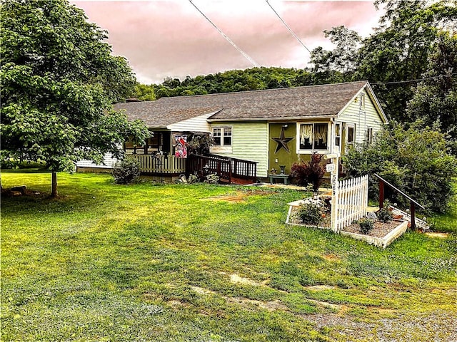 5569 Bull Creek Rd, Fawn Twp, PA 15084 - view of front of house with a wooden deck and a front lawn