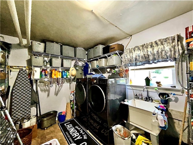 5569 Bull Creek Rd, Fawn Twp, PA 15084 - storage with washer and clothes dryer and a sink