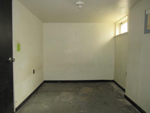 129 Windsor Dr, Penn Hills, PA 15235 - unfurnished room with unfinished concrete flooring and baseboards