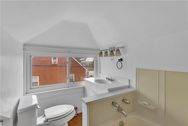 1505 Raymond Ave, Latrobe, PA 15650 - full bathroom featuring vaulted ceiling, a tub to relax in, and vanity