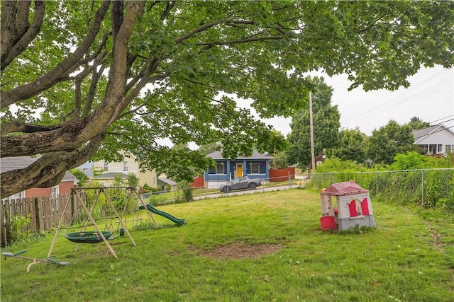 1505 Raymond Ave, Latrobe, PA 15650 - fenced backyard featuring a playground