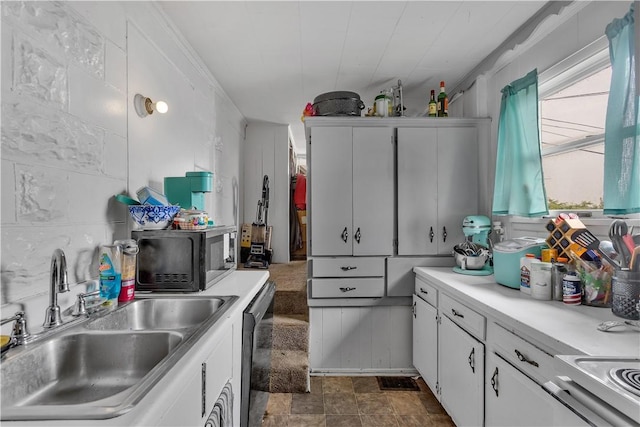 1505 Raymond Ave, Latrobe, PA 15650 - kitchen featuring dishwashing machine, white cabinets, light countertops, and stainless steel electric range oven