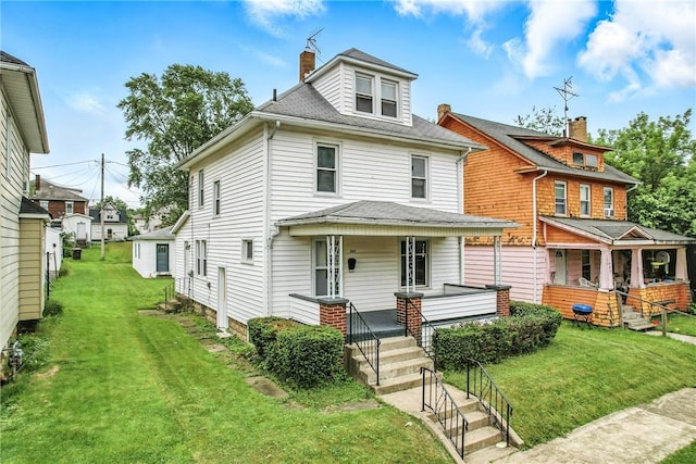 385 Spruce Ave, Sharon, PA 16146 - american foursquare style home featuring a porch, a front lawn, roof with shingles, and a chimney