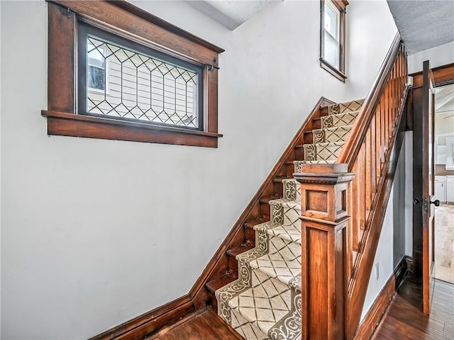 385 Spruce Ave, Sharon, PA 16146 - staircase with wood finished floors and plenty of natural light