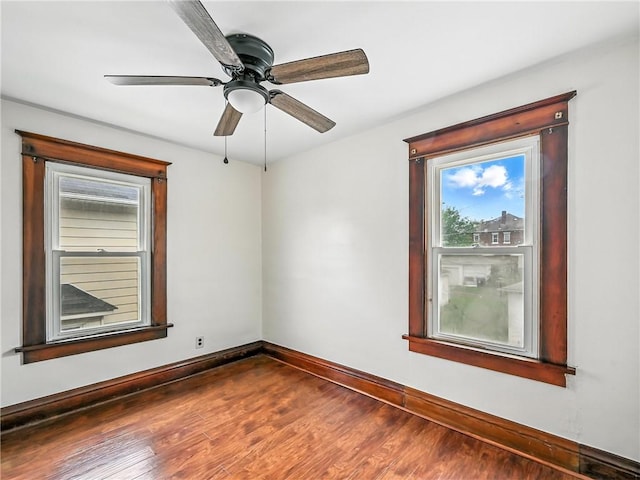 385 Spruce Ave, Sharon, PA 16146 - unfurnished room with dark wood-type flooring and ceiling fan
