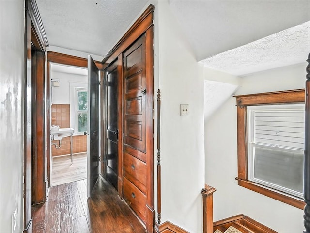 385 Spruce Ave, Sharon, PA 16146 - corridor featuring dark wood-style floors and a textured ceiling