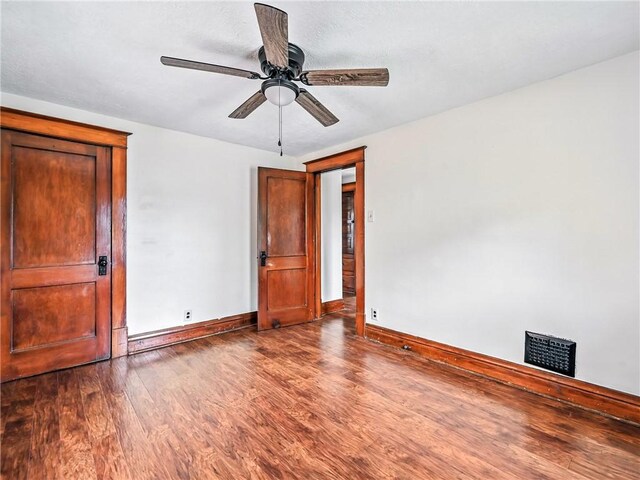 385 Spruce Ave, Sharon, PA 16146 - unfurnished bedroom featuring wood finished floors and a ceiling fan