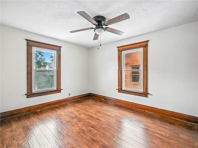 385 Spruce Ave, Sharon, PA 16146 - unfurnished room with hardwood / wood-style flooring, ceiling fan, and a textured ceiling
