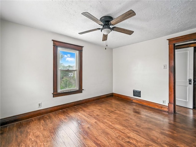 385 Spruce Ave, Sharon, PA 16146 - unfurnished room with wood finished floors, a textured ceiling, and a ceiling fan