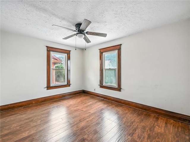 385 Spruce Ave, Sharon, PA 16146 - empty room with hardwood / wood-style floors, a ceiling fan, and a textured ceiling
