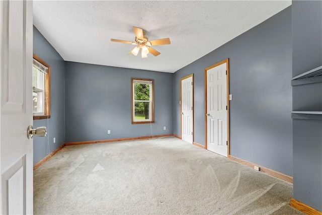 2228 Dinnerbell Five Forks Rd, Wharton Twp, PA 15437 - unfurnished bedroom featuring carpet, a textured ceiling, and a ceiling fan