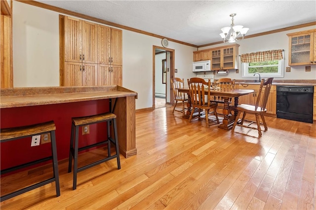 2228 Dinnerbell Five Forks Rd, Wharton Twp, PA 15437 - kitchen with black dishwasher, white microwave, light wood-type flooring, a chandelier, and crown molding