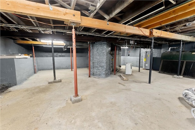2228 Dinnerbell Five Forks Rd, Wharton Twp, PA 15437 - unfinished basement featuring water heater and oil tank