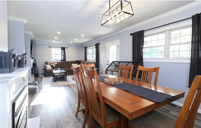 407 1st St, South Union Twp, PA 15401 - dining area featuring ornamental molding, wood finished floors, recessed lighting, and a chandelier