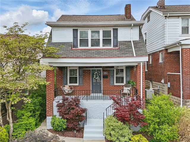 3236 Beacon Hill Ave, Dormont, PA 15216 - view of front facade with a porch and a chimney