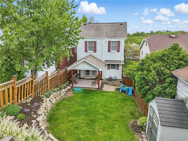 3236 Beacon Hill Ave, Dormont, PA 15216 - back of property with a patio, roof with shingles, and a fenced backyard