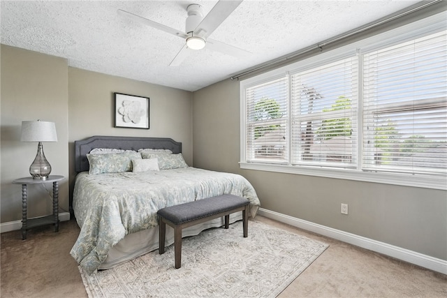 3236 Beacon Hill Ave, Dormont, PA 15216 - bedroom featuring carpet floors, a textured ceiling, and a ceiling fan