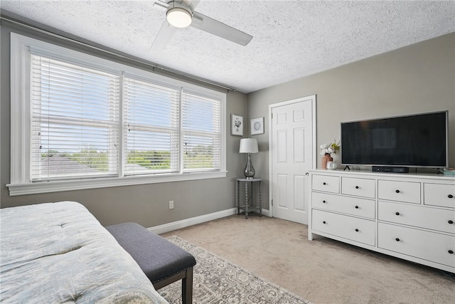 3236 Beacon Hill Ave, Dormont, PA 15216 - bedroom featuring light colored carpet, a textured ceiling, and a ceiling fan