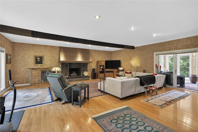 117 Scarborough Ln, Peters Twp, PA 15317 - living room with light wood-style flooring, a large fireplace, beamed ceiling, recessed lighting, and wallpapered walls