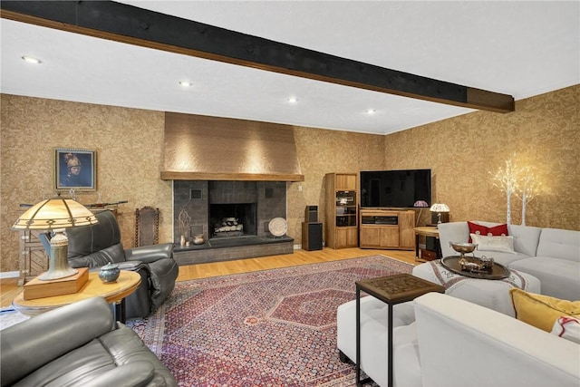 117 Scarborough Ln, Peters Twp, PA 15317 - living room featuring wood finished floors, a large fireplace, recessed lighting, beam ceiling, and wallpapered walls