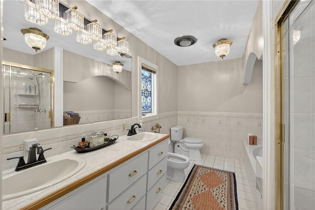 117 Scarborough Ln, Peters Twp, PA 15317 - bathroom with tile patterned flooring, a bidet, a shower stall, a garden tub, and double vanity