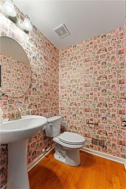 4015 Bentwood Dr, North Strabane, PA 15317 - bathroom featuring wallpapered walls and wood finished floors