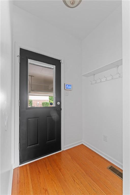 4015 Bentwood Dr, North Strabane, PA 15317 - entryway with baseboards and wood finished floors