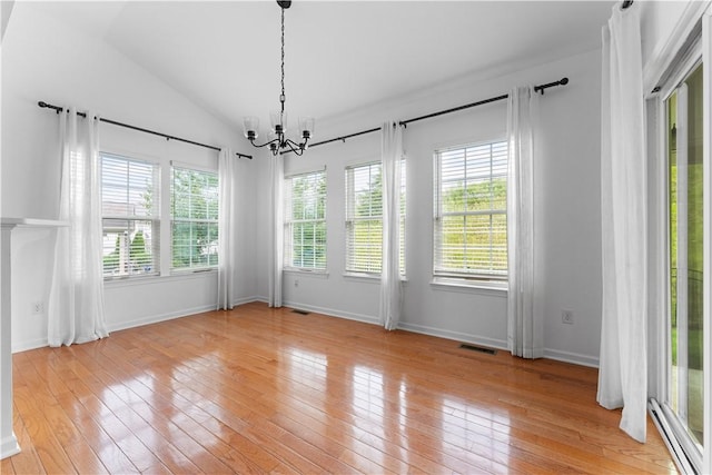 4015 Bentwood Dr, North Strabane, PA 15317 - unfurnished dining area featuring a chandelier, lofted ceiling, and light wood finished floors