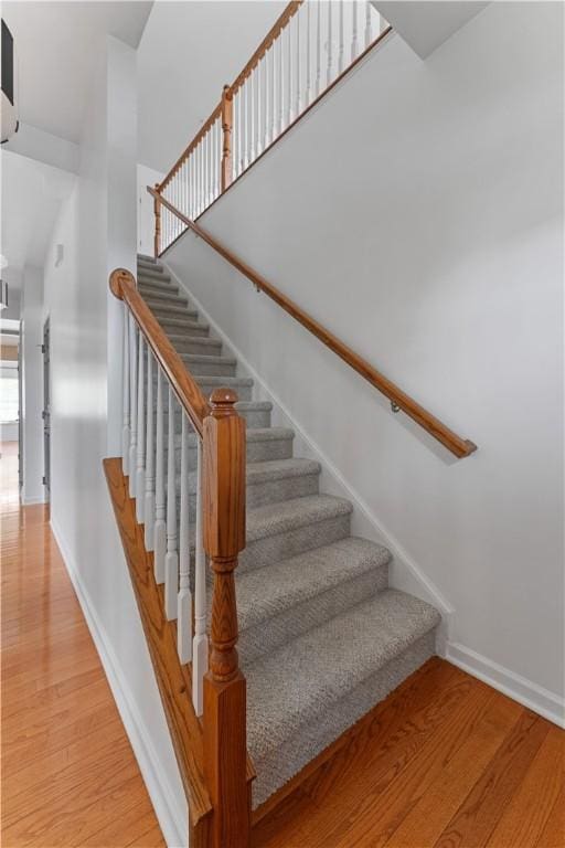 4015 Bentwood Dr, North Strabane, PA 15317 - stairway with wood finished floors and a high ceiling