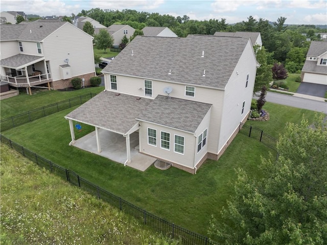4015 Bentwood Dr, North Strabane, PA 15317 - rear view of property featuring a shingled roof, a patio, a fenced backyard, and a residential view