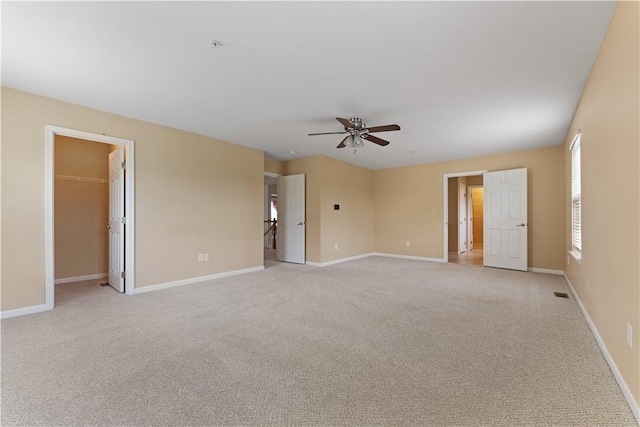 4015 Bentwood Dr, North Strabane, PA 15317 - unfurnished bedroom featuring light carpet, a walk in closet, and a ceiling fan